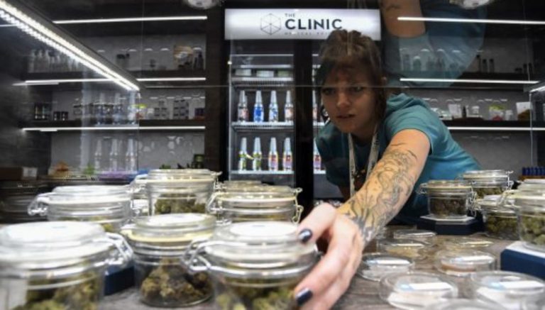 Colorado governor pledges to veto pot clubs bill unless changes made