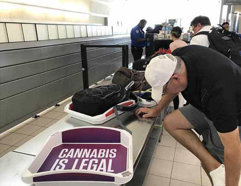 Pot Ads Appear In TSA Security Bins At Airport